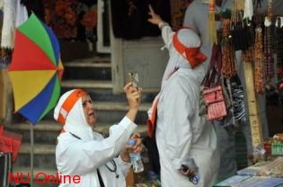 World&#039;s Muslims speak with signs, gestures in Mecca