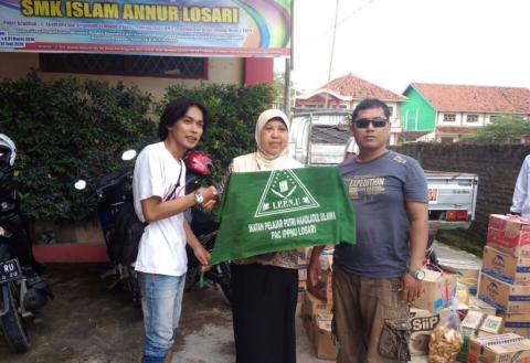 Pelajar NU Losari Cirebon Turun Bantu Korban Banjir di Brebes