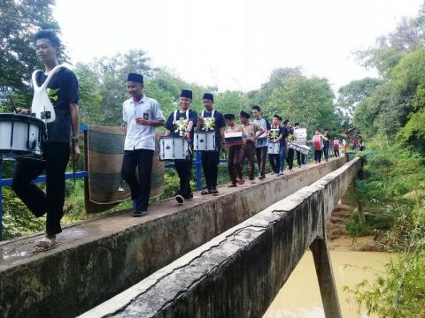 Peduli Banjir, Marching Band Ini Keliling Kampung Galang Dana
