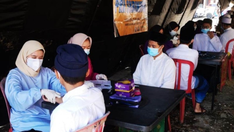Bekerja Sama dengan Polres, GP Ansor Kabupaten Bogor Gelar Vaksinasi Massal