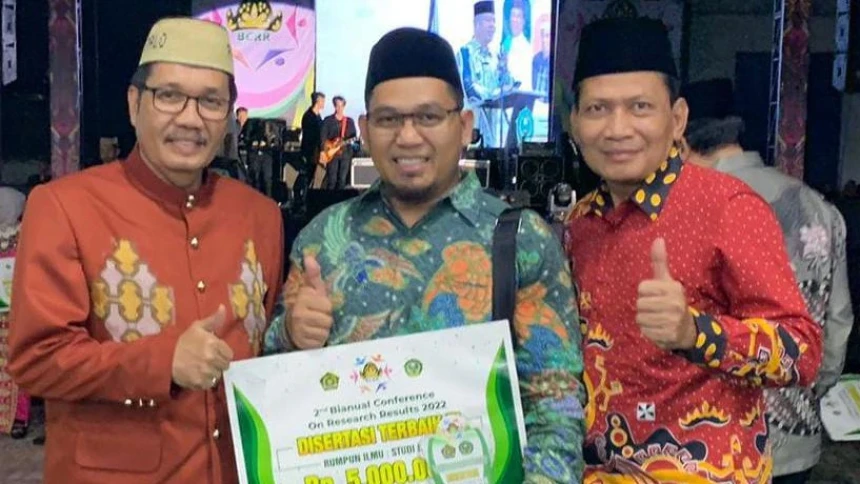Angkat Bahtsul Masail NU, Disertasi Dosen IAIMNU Metro Lampung Ini Raih Penghargaan