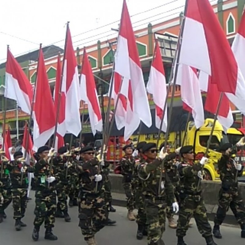 Ribuan Warga NU Mranggen Peringati Harlah dengan Kirab Bendera Merah Putih