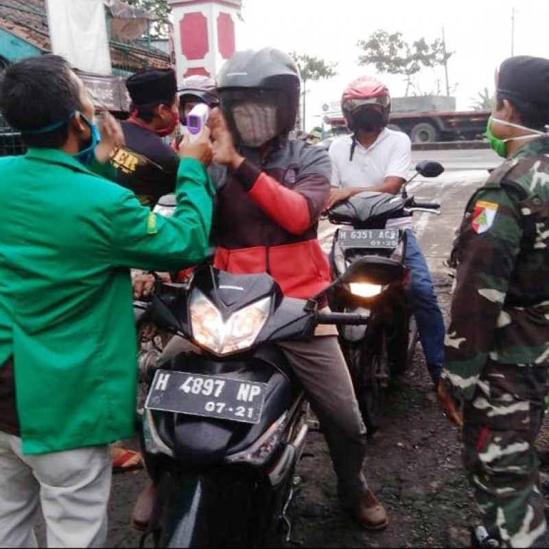 Cegah Wabah Covid-19, Banser Perketat di Perlintasan Semarang Demak