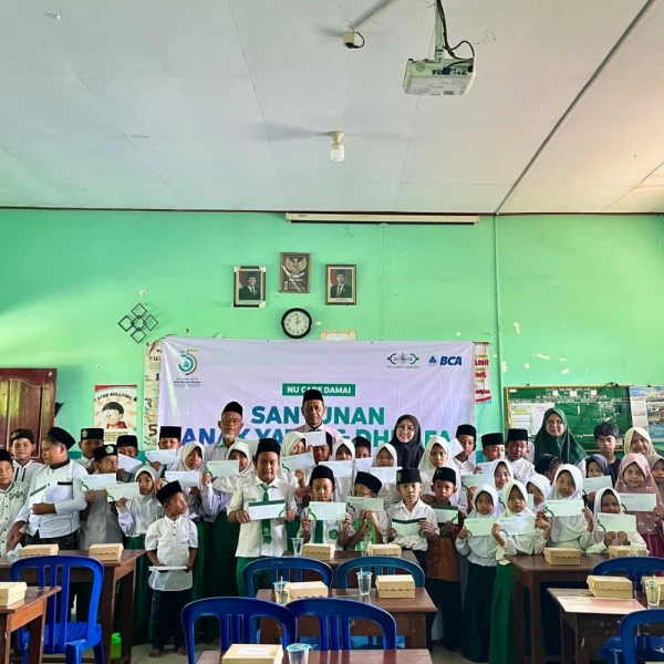 LAZISNU PCNU Jombang Santuni 300 Yatim, Dhuafa, dan Anak Disabilitas setelah Muktamar