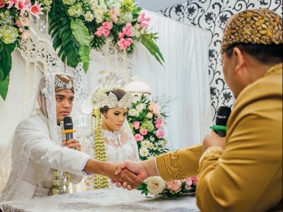 Hukum Calon Suami Mewakilkan Akad Nikah karena Positif Covid-19